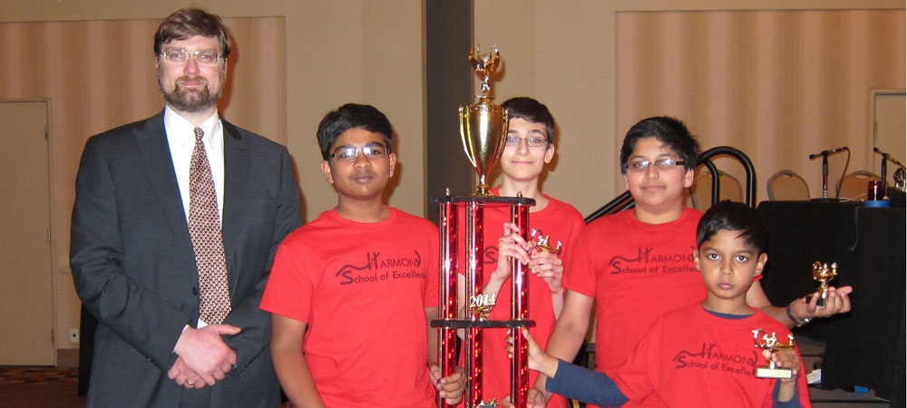 Harmony School of Excellence with their first-place trophy from the 2014 Middle School National Championship Tournament