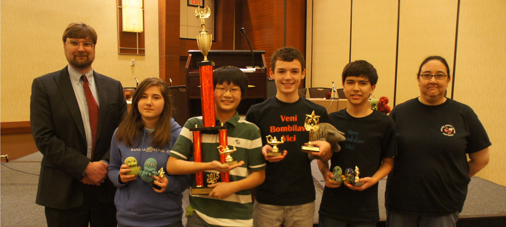 Kealing with their first-place trophy from the 2015 Middle School National Championship Tournament