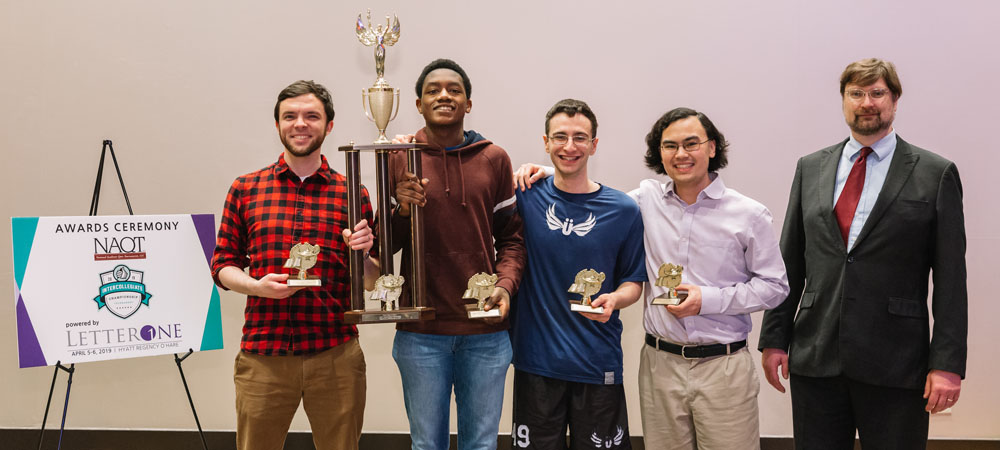 Yale A with their First-Place Division I trophy from the 2019 Intercollegiate Championship Tournament, powered by LetterOne
