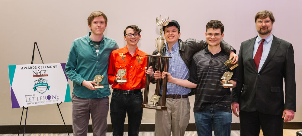 Michigan State with their First-Place Undergraduate trophy from the 2019 Intercollegiate Championship Tournament, powered by LetterOne